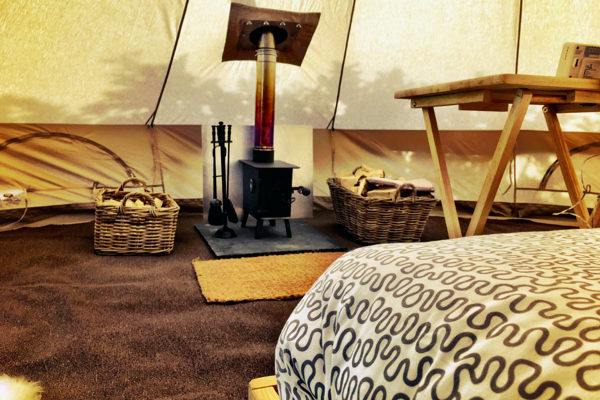 Winter Glamping & Heated Tents with Wood Burner Inside Honeybells